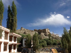 A view of Leh Palace over a school yard, looking east from Sankar Rd near the Leh Police Station.