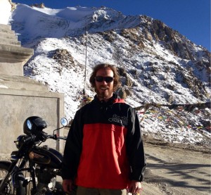 India's Chang la (5289 m), wearing a second hand jacket from Canada, vacuum sealed and sent to India via a port in Gujarat in perfect, compressed cubes. It is a baseball/softball pullover that reads "too black", an apparent pun that would have otherwise outlived its useful life but for an American on the other end.