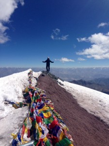 The German striking a pose on the summit before turning into a bird and flying away.