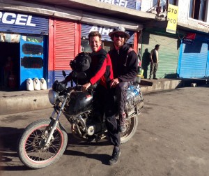 Leaving Leh early morning on motorbike from Leh to Stok Village, we pass through the village of Choglamsar and stop for tea. A local takes a picture of our motley transport, the extra 200+ lbs on the back dogging the shocks and giving the German's Pulsar 190 bike a workout. The nearby narrow and truck wedged bridge tests the driver's agility also.