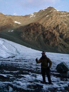 Day 3's summit push. Just before crossing the glacier in moonlight, it is freezing cold. A sock monkey hat protects my ears. On the other side, a boulder field, where the sun will eventually find us in a few hours. We estimate 7 hours up from the base camp to summit, 5 for the return.