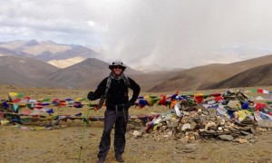 Atop Kyamayuri La with crazy skies approaching after steep climb out of the nomads' valley at Rachungkaru. Watching shepards leading their flock over the passes in half the time it took us was impressive, and only a days work for them.