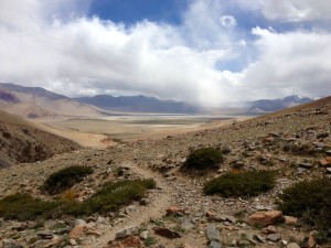 Tso Kar coming into view, descending Shinbuk La (5300) on narrow loose trail.