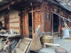 The square hewn timbers leave lots of space for chinking, I am not sure what is used for materials though clearly an earth mud for the final seal. Post and beam construction give a warm relief.