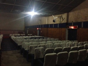 Night Cap. The movie theater in Shimla, atop the hill and actually past the YMCA and many, many steps up. The balcony overhead and behind is load with talk and laughter; I shush people twice. It is warm inside despite particularly cool to cold weather outside. Krish 3 is showing and I leave at the program at intermission to return to the large, quite and empty Overlook Hotel'esque Shimla Y